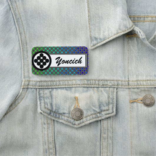 ケネス・ヨンシックによる九つの輪 名札 (インサイチュ)