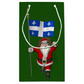 ケベックの看板を持つサンタクロース スモールペーパーバッグ (裏面)