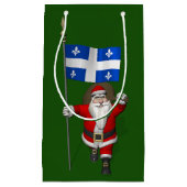 ケベックの看板を持つサンタクロース スモールペーパーバッグ (正面)