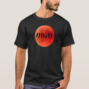 ケーブルシルエット上の血の月の月食の鳥 Tシャツ