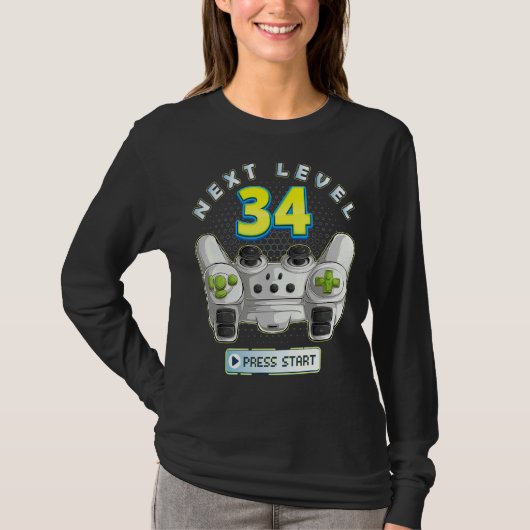 ゲーマー34誕生日次レベル34ゲームコントローラー Tシャツ (正面)