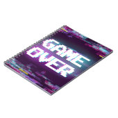 ゲームオーバーのコンセプト、グリッチ効果。 ノートブック (左側)