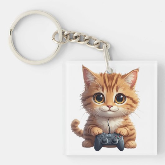 ゲームコントローラーを握る子猫　ゲーマー猫 キーホルダー (正面)