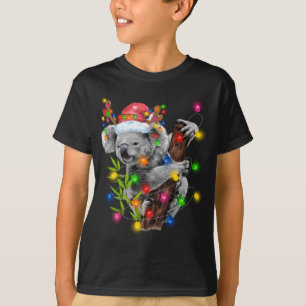 コアラおもしろいクリスマスライトサンタハッメリーチ Tシャツ