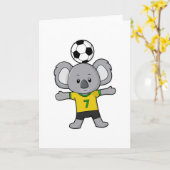 コアラがサッカーボールと一緒にサッカー選手 カード (黄色い花)