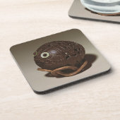 ココナッツは顔、c.1895に彫刻しました コースター (左側)