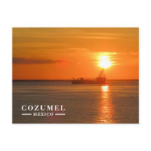コスメルの黄金の夕日と船のシルエット