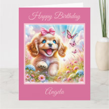 コッカースパニエルと蝶の子犬