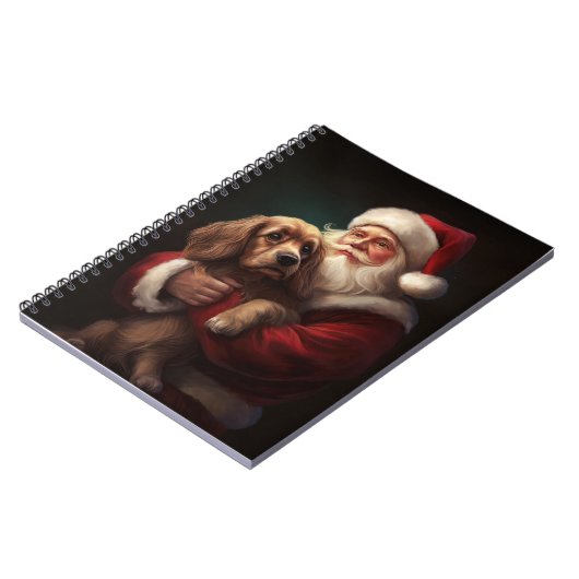 コッカースパニエル犬とサンタクロースフェスティバルクリスマス ノートブック (左側)