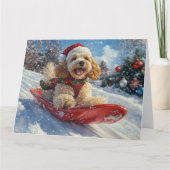 コッカースパニエル犬ドッグインスレッジそれを雪のクリスマス カード (正面)