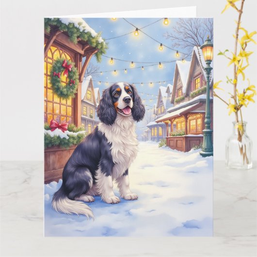 コッカースパニエル 雪景色の村のクリスマスアート カード (黄色い花)