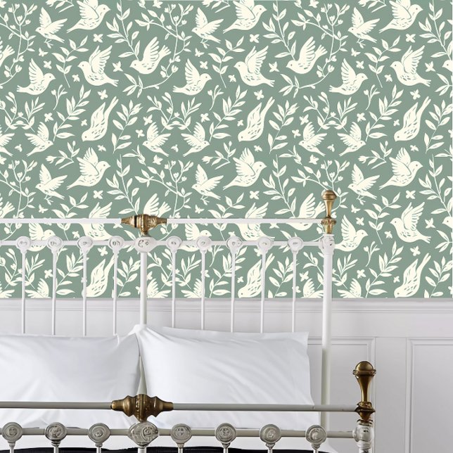 コテージコアホワイトペーパーカッ飛んでいるトバード 壁紙 (Cottagecore White Papercut Flying Birds Wallpaper behind a white metal framed bed.)