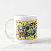 コニーアイランドのヴィンテージの郵便はがきのマグからの挨拶 コーヒーマグカップ (左)