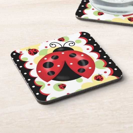 コルクの背部が付いているてんとう虫のコースター コースター (左側)