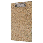 コルク背景のテクスチャと構造のギフト クリップボード (左)