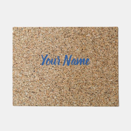 コルク背景のテクスチャと構造のギフト ドアマット (正面)