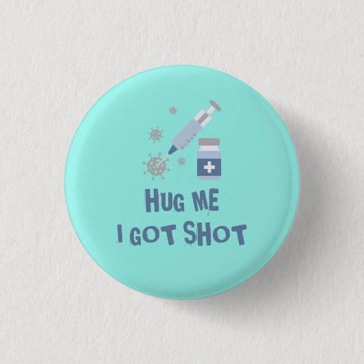 コロナワクチン接種を受け得た「Hug me, I shot」 缶バッジ (正面)
