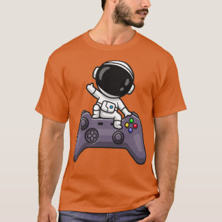 コントローラー漫画に手を振るかわいい宇宙飛行士 Tシャツ