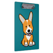 コーギーのコーギーは子犬の小犬の幸せなペンブロークウェールズの後をつけます クリップボード (右)