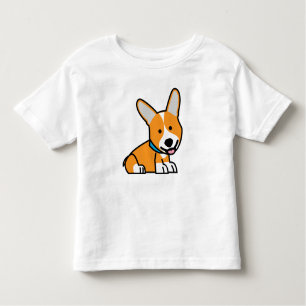コーギーのコーギーは子犬の小犬の幸せなペンブロークウェールズの後をつけます トドラーTシャツ