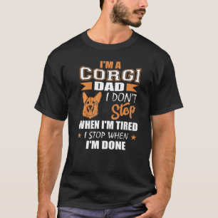 コーギーを飼うパパ 仕事が終わるまで休むな 疲れたら休め Tシャツ
