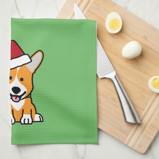 コーギー犬の子犬のペンブロークのウェールズのクリスマスのサンタの帽子 キッチンタオル (四つ折り)