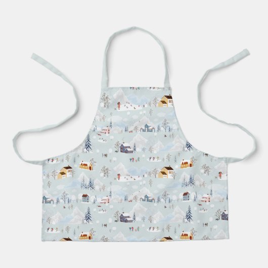 コージーウィンターワンダーランドアイススケートで滑るビレッジパターン エプロン (正面)