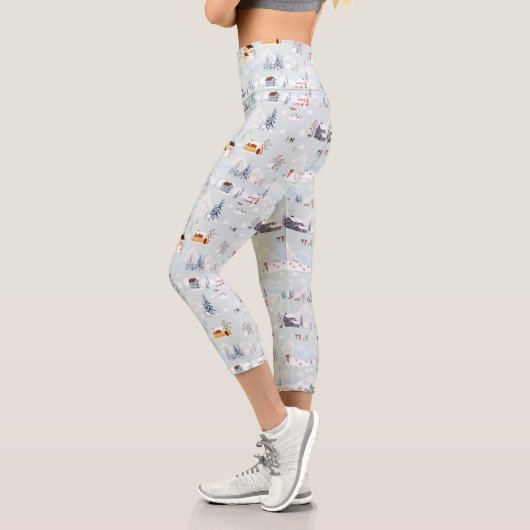 コージーウィンターワンダーランドアイススケートで滑るビレッジパターン カプリレギンス
