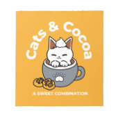 コージーキャットとポークッキーを使用したホリデーマグデザイン ノートパッド (正面)