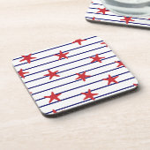 コースターセット – 赤いヒトデ コースター (左側)