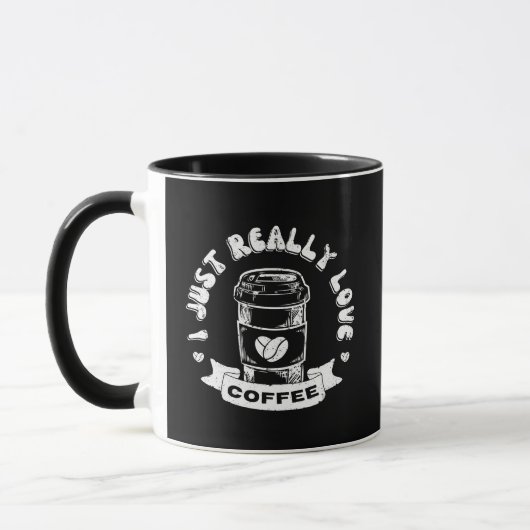 コーヒーが本当に大好き マグカップ (左)