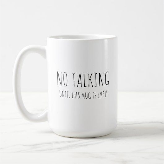 コーヒーのユーモア、"話さない"皮肉 コーヒーマグカップ (左)