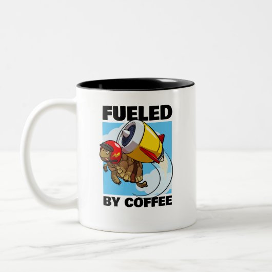 コーヒーの亀の漫画おもしろいに飛んでいる煽られる ツートーンマグカップ (左)