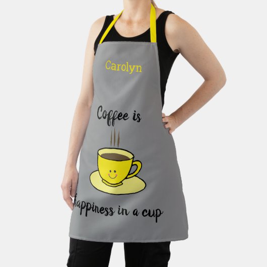 コーヒーはカップの中の幸福で、黄色パーソナライズされた。 エプロン (インサイチュ)