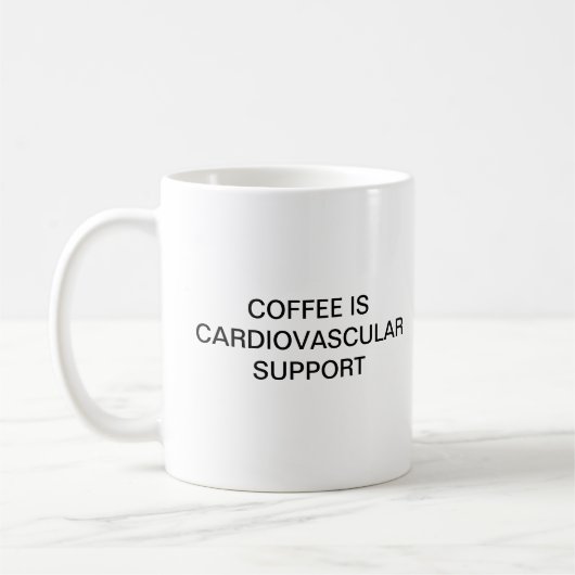 コーヒーは心血管サポートです コーヒーマグカップ (左)