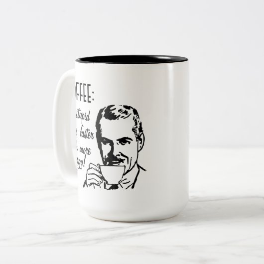 コーヒーは愚かな事をより速くします ツートーンマグカップ (正面左)
