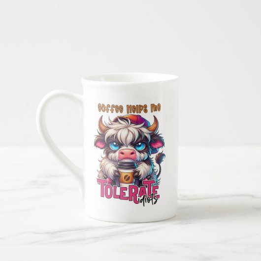 コーヒーは馬鹿耐える助けに ボーンチャイナマグカップ (左)