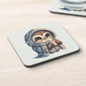 コーヒーを入れたかわいい大きな目のフクロウ コースター (左側)