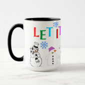 コーヒーマグの上に雪だるまを積んで雪を降らせる マグカップ (左)