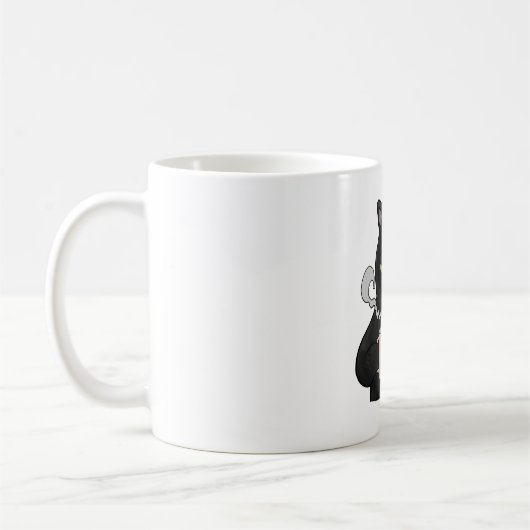 コーヒーモーニングと不機嫌な黒猫 コーヒーマグカップ (左)
