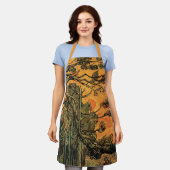 ゴッホの松の木と赤い空と夕日 エプロン (着用した状態)