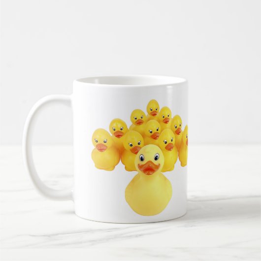 ゴムはユーモアのコーヒー・マグを引込めます コーヒーマグカップ (左)