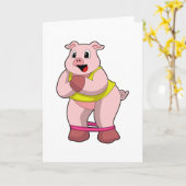 ゴムバンドをつけたフィットネスの豚 カード (黄色い花)