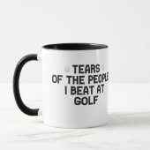 ゴルフの人々の涙ビートおもしろい マグカップ (左)