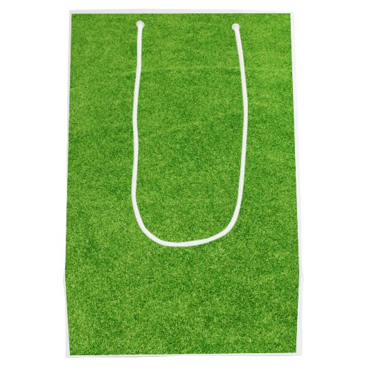 ゴルフの第1の誕生日と緑のゴルフフラグ ミディアムペーパーバッグ (裏面)