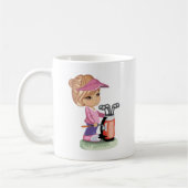 ゴルフを遊んでいるブロンドの小さな女の子 コーヒーマグカップ (左)