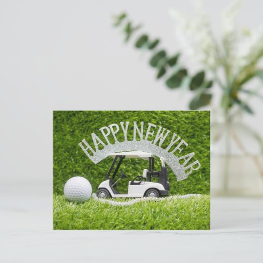 ゴルファーのための緑の草の上にゴルフの新年を幸せ シーズンポストカード (スタンド正面)