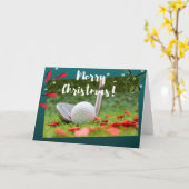 ゴルフアイアンとボールがグリーンクリスマスに出ている カード (黄色い花)