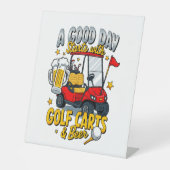 ゴルフカートから始まる神の日 台座サイン (正面)