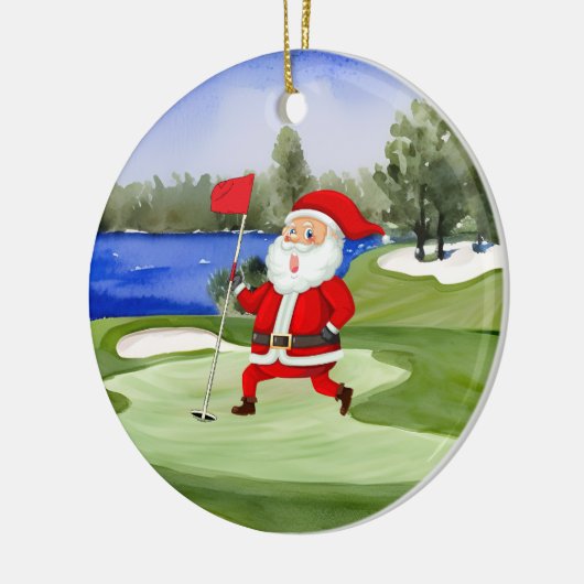 ゴルフクリスマスサンタクロースが緑に旗を掲げている セラミックオーナメント (左)